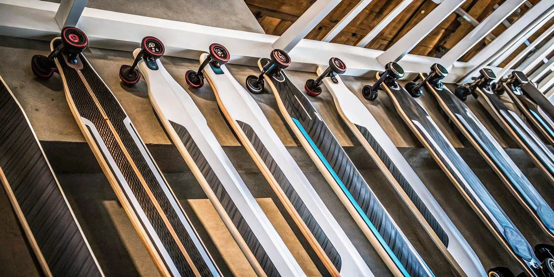 A selection of the best electric longboards for adults, featuring various models and deck styles.