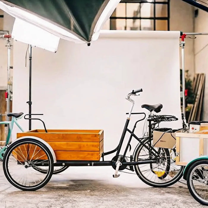 Best front load cargo bike with a large wooden box for hauling.