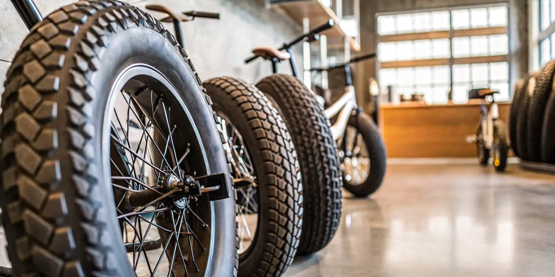 Several fat tire electric trikes for review, featuring all-terrain tires and stable frames.