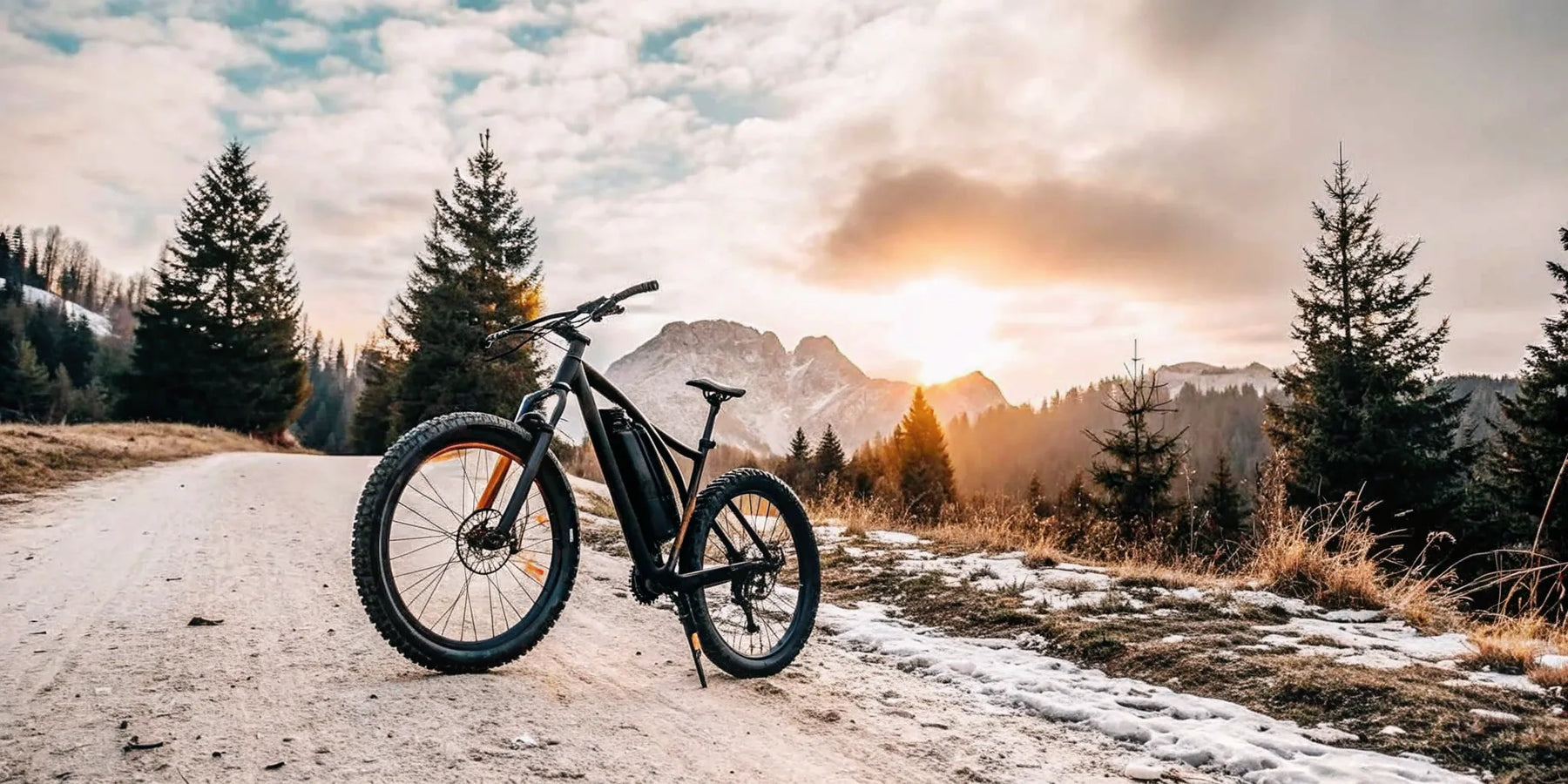 Best off road ebike of 2026 on a rugged mountain trail at sunrise.