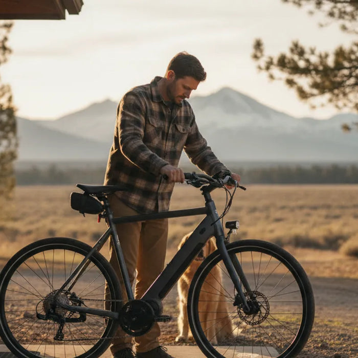 Electric bike owner checking a commuter e-bike before a ride
