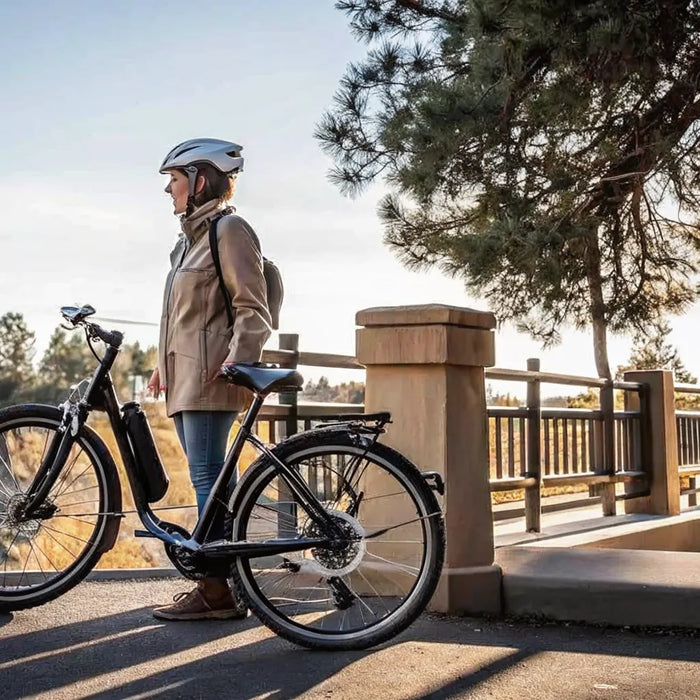 Senior test riding an electric bike for seniors on a paved trail near Bend, Oregon