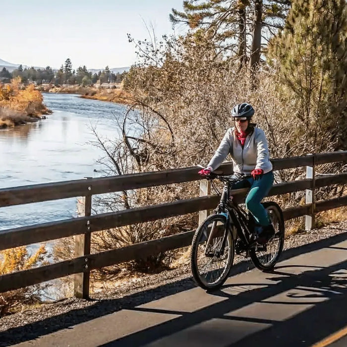 Electric bike riders exploring a paved trail in Bend Oregon