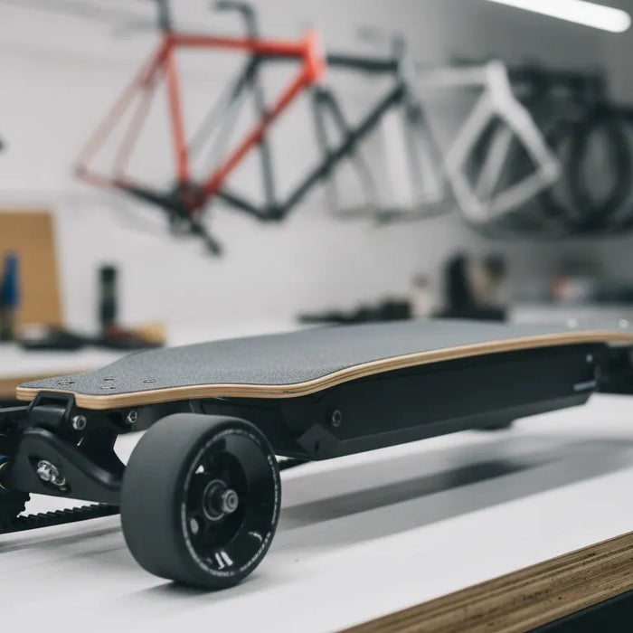 Belt-drive Exway X1 Max style electric skateboard shown in a workshop