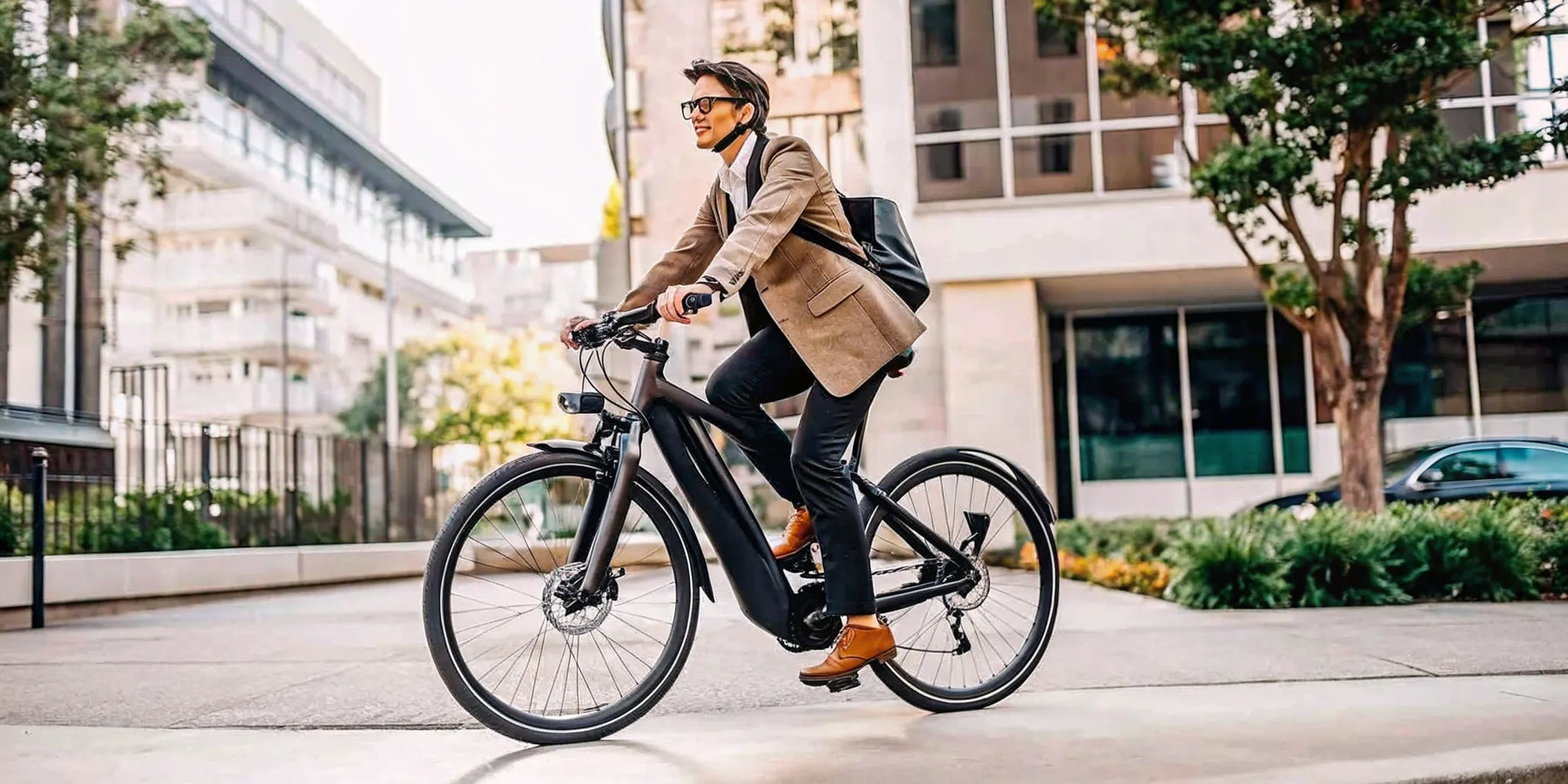 A person commuting on a fast electric bike through a city.