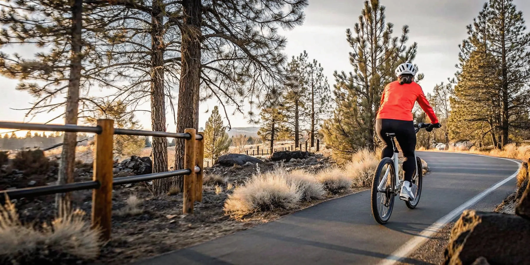 Rider gliding on a Segway torque-sensing electric bike on a scenic Bend Oregon path