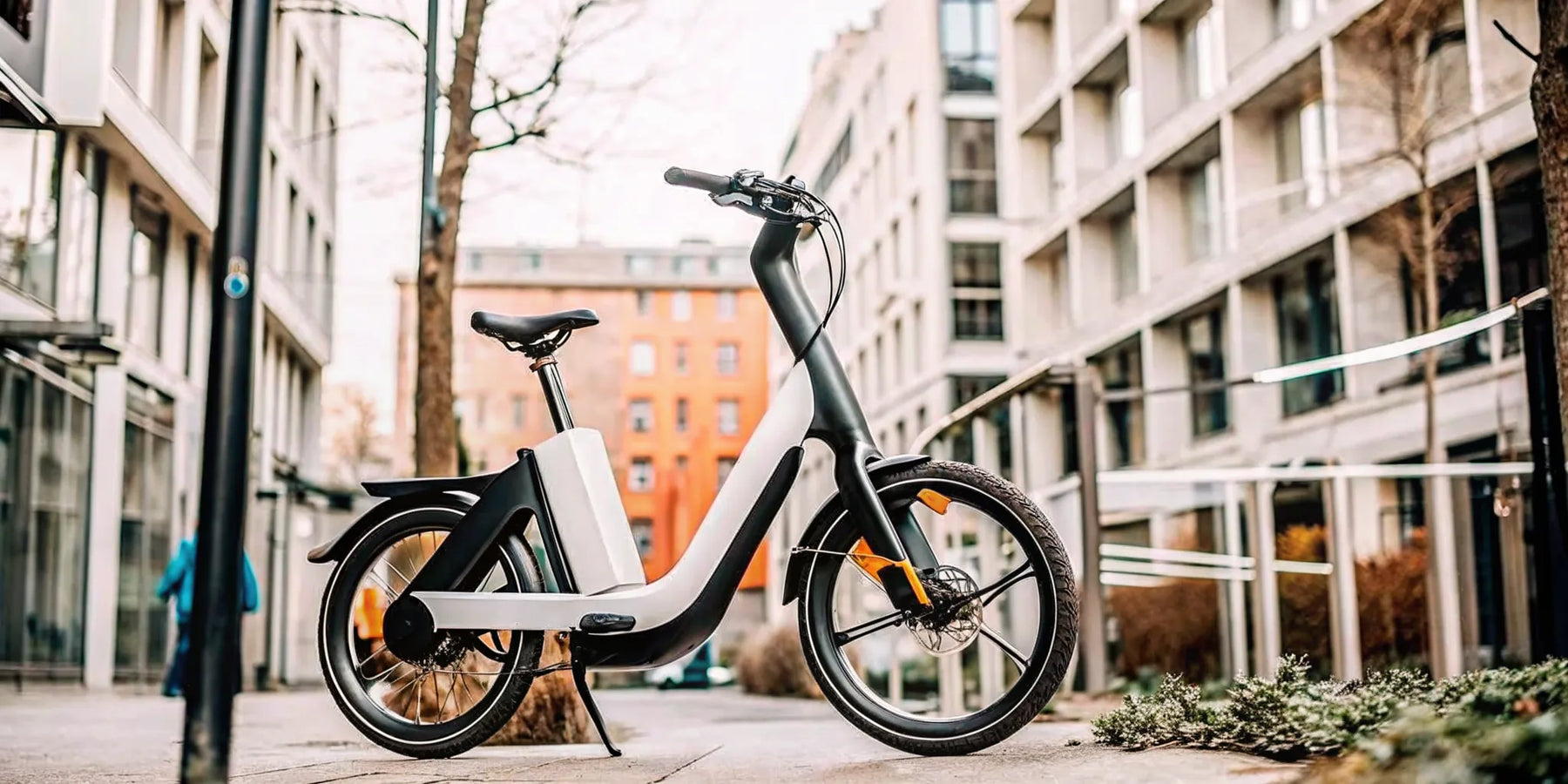 Segway Myon electric commuter bike in urban setting with integrated lights and sleek design