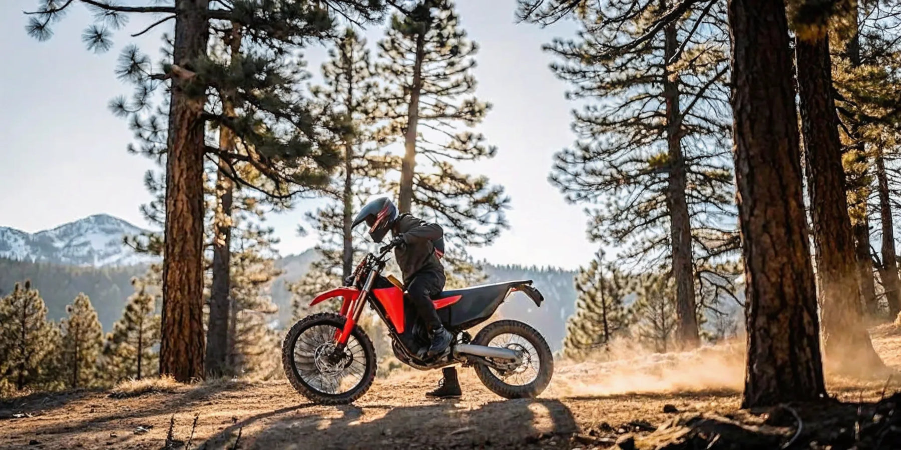 Segway Xaber 300 electric dirt bike in red and black on a Central Oregon trail