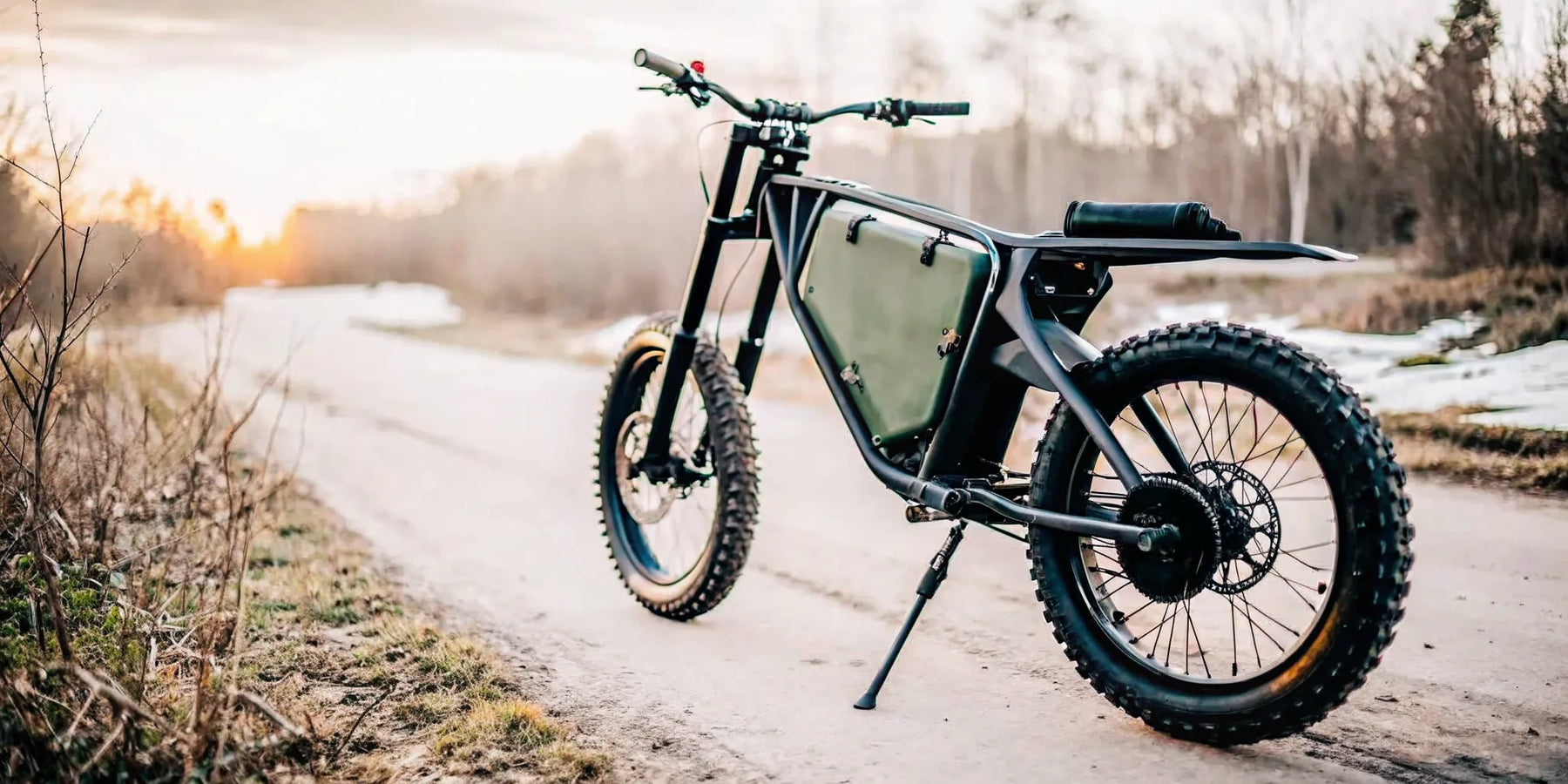 Segway Xaber 300 electric dirt bike for hunting parked on an off-road trail.