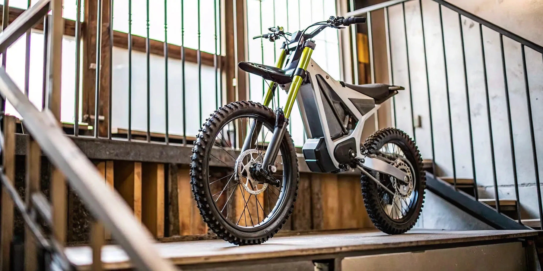 A Segway Xaber 300 electric dirt bike on a trail, ready for a real-world range test.
