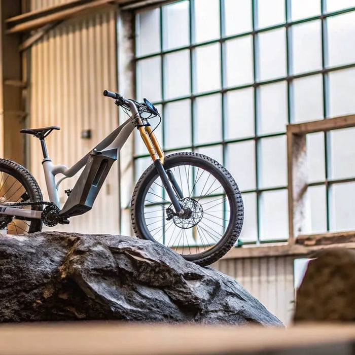 Segway Xaber 300 electric dirt bike tackling rocky terrain.