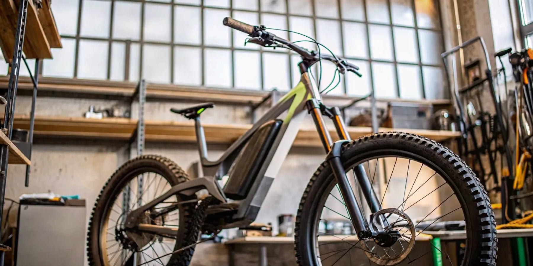 Segway Xaber 300 electric trail bike in a workshop.