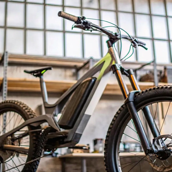 Segway Xaber 300 electric trail bike in a workshop.