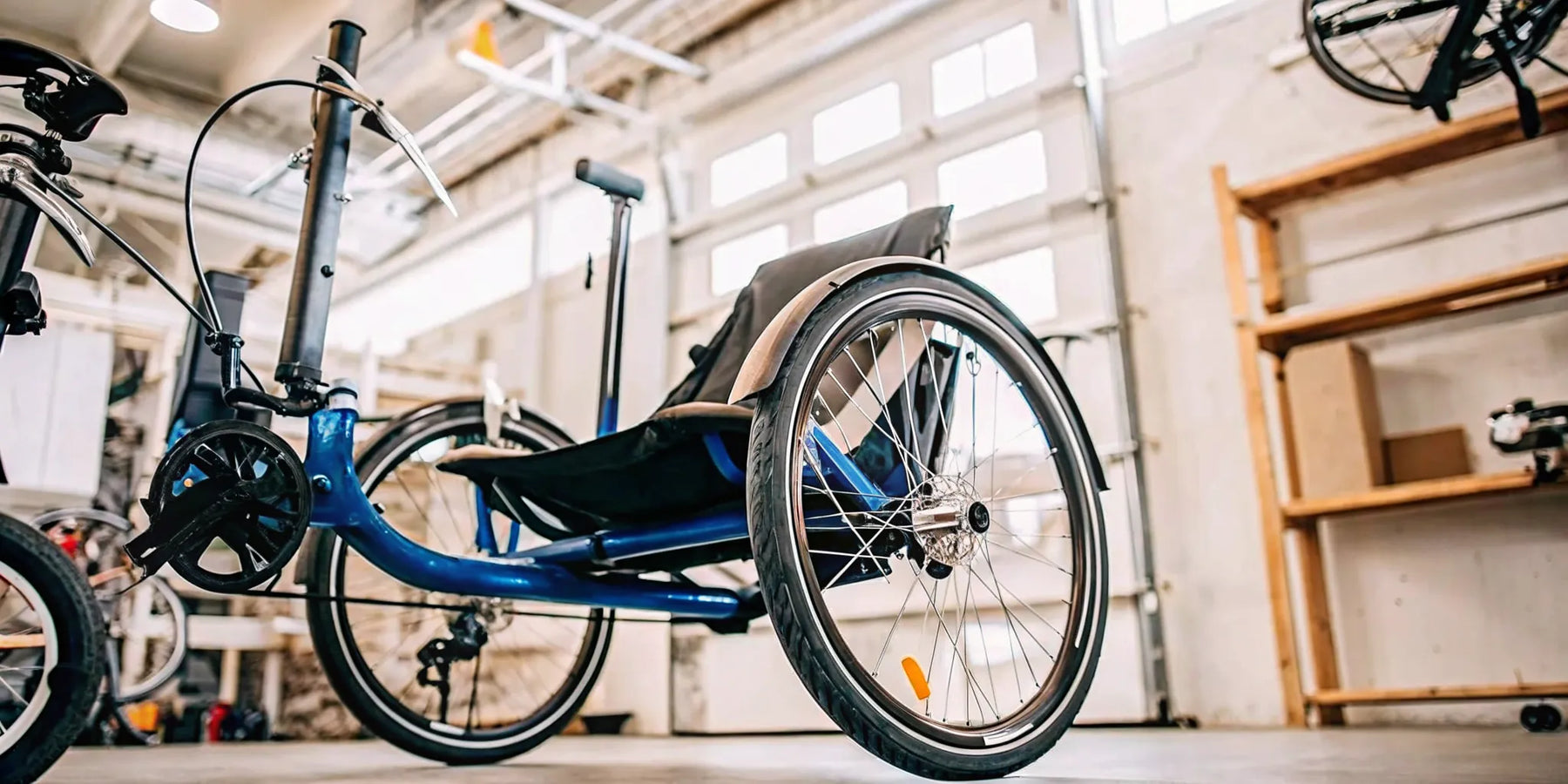 A stable semi recumbent electric trike with a supportive seat and pedal assist.