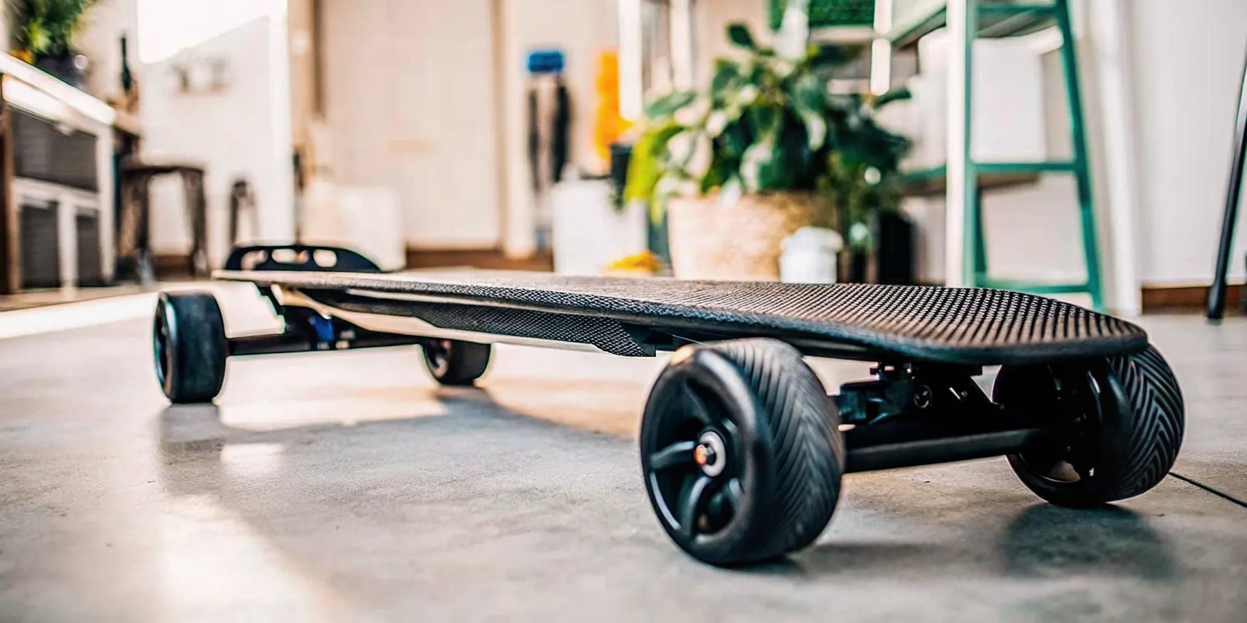 The best electric skateboard recommended by Reddit, featuring large wheels for performance.