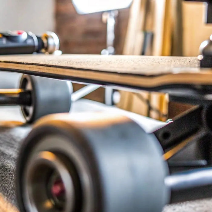 A high-performance electric skateboard with its wireless remote.