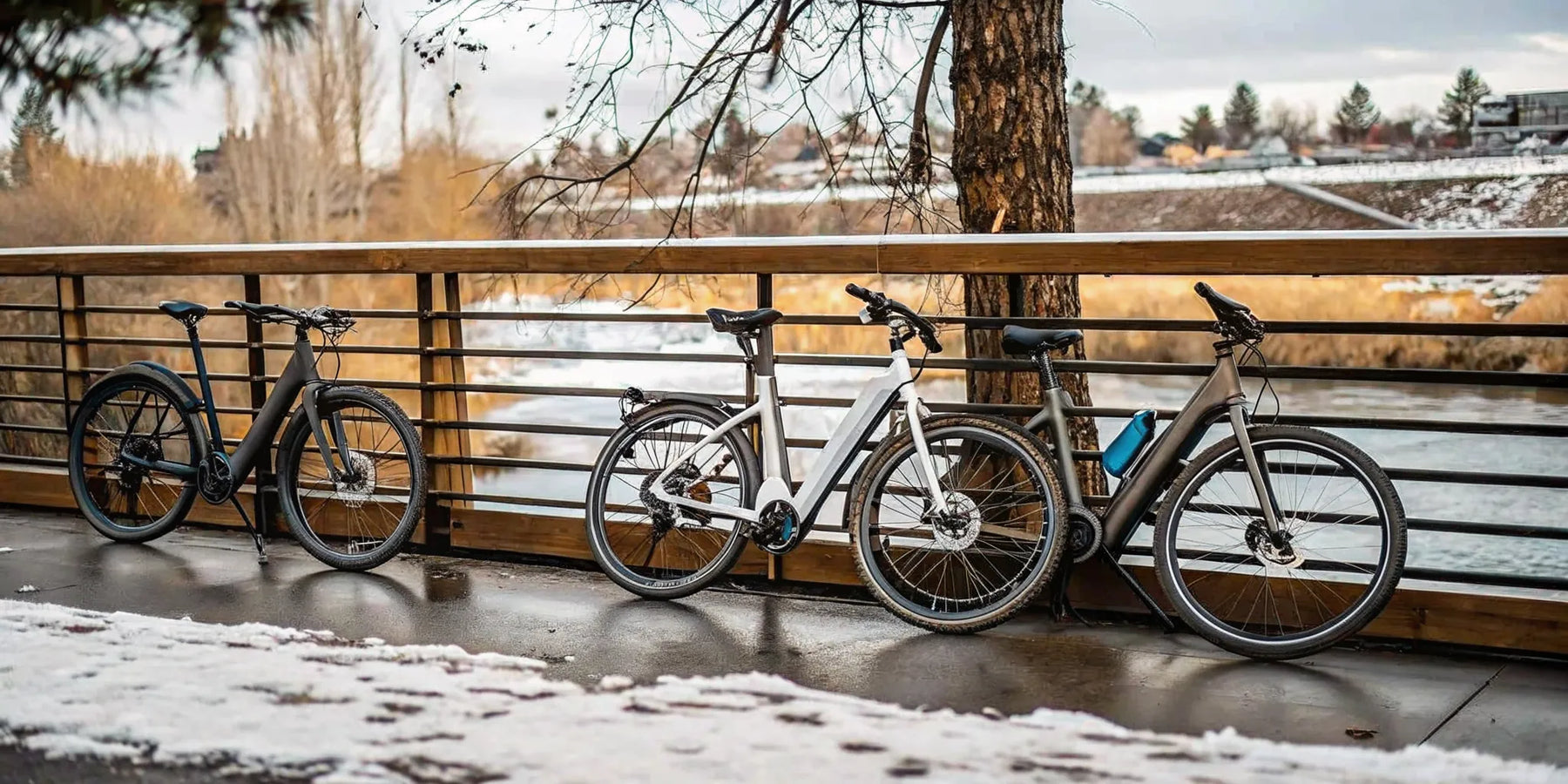 Three electric bikes on a snowy trail in Bend, Oregon.