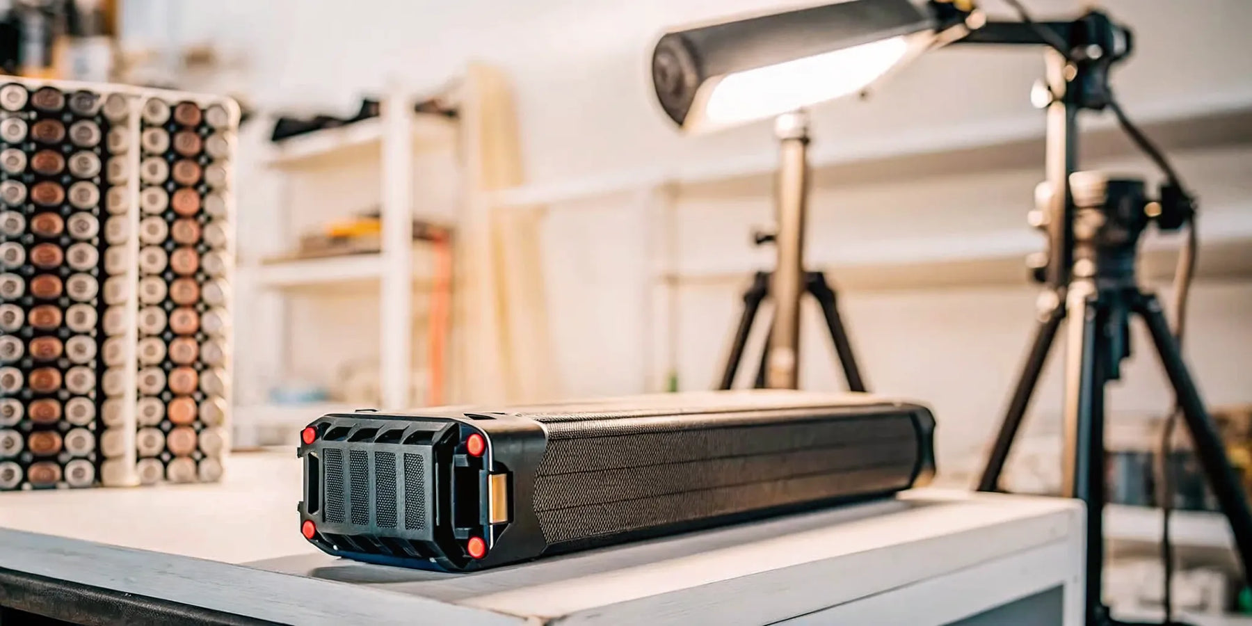 An electric bike battery with internal cells exposed, providing essential information.