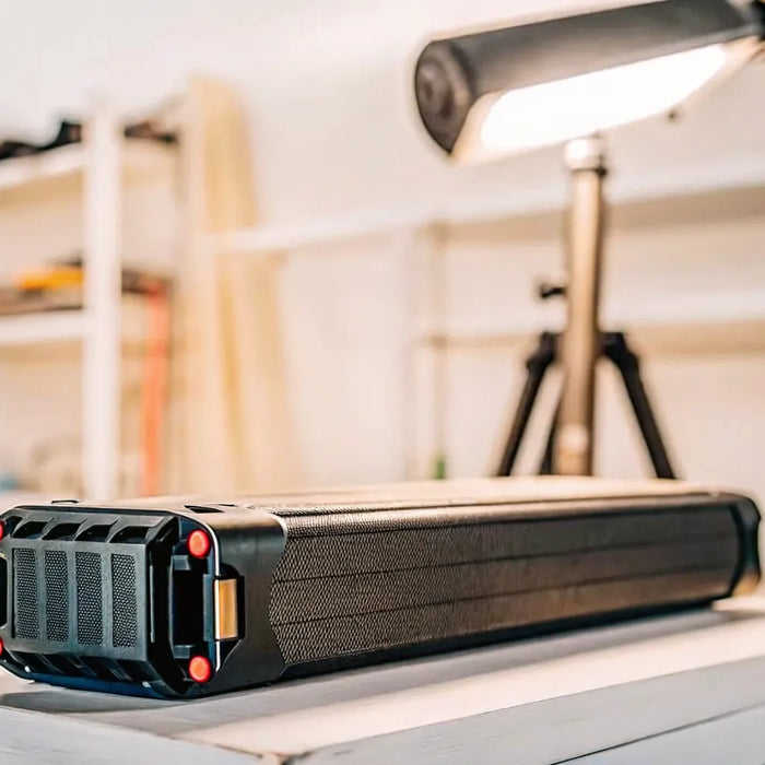 An electric bike battery with internal cells exposed, providing essential information.