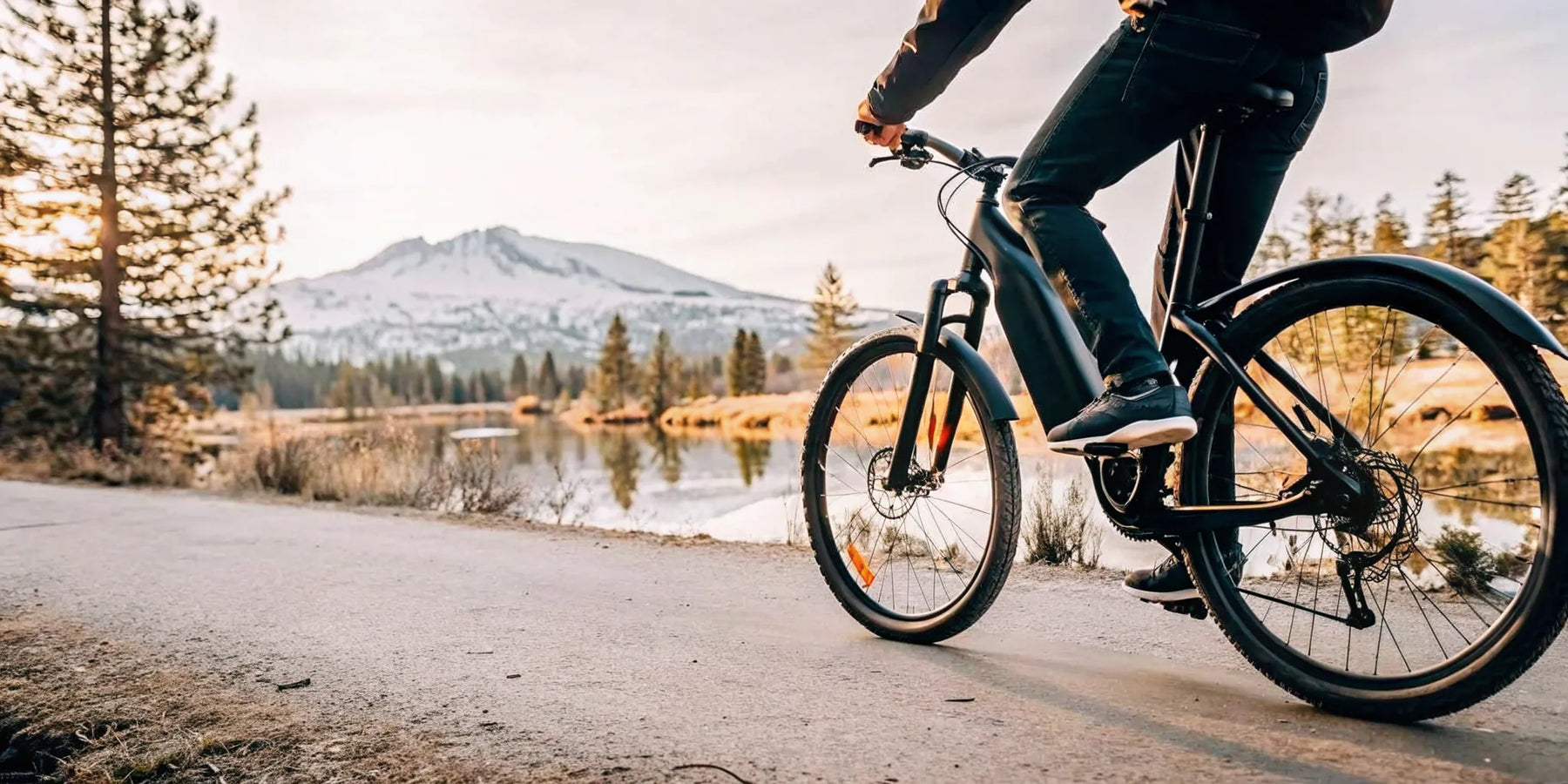 Rider pedaling a torque-sensing Segway electric bike along a Central Oregon river trail