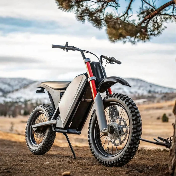 A Segway Xaber 300 electric dirt bike rental parked on a trail in Bend, Oregon.