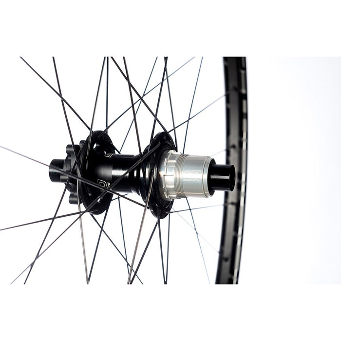 Stans No Tubes Podium SRD Wheel Rear 29'' / 622 Holes: 28 12mm TA 148mm Disc IS 6-bolt Shimano Micro Spline